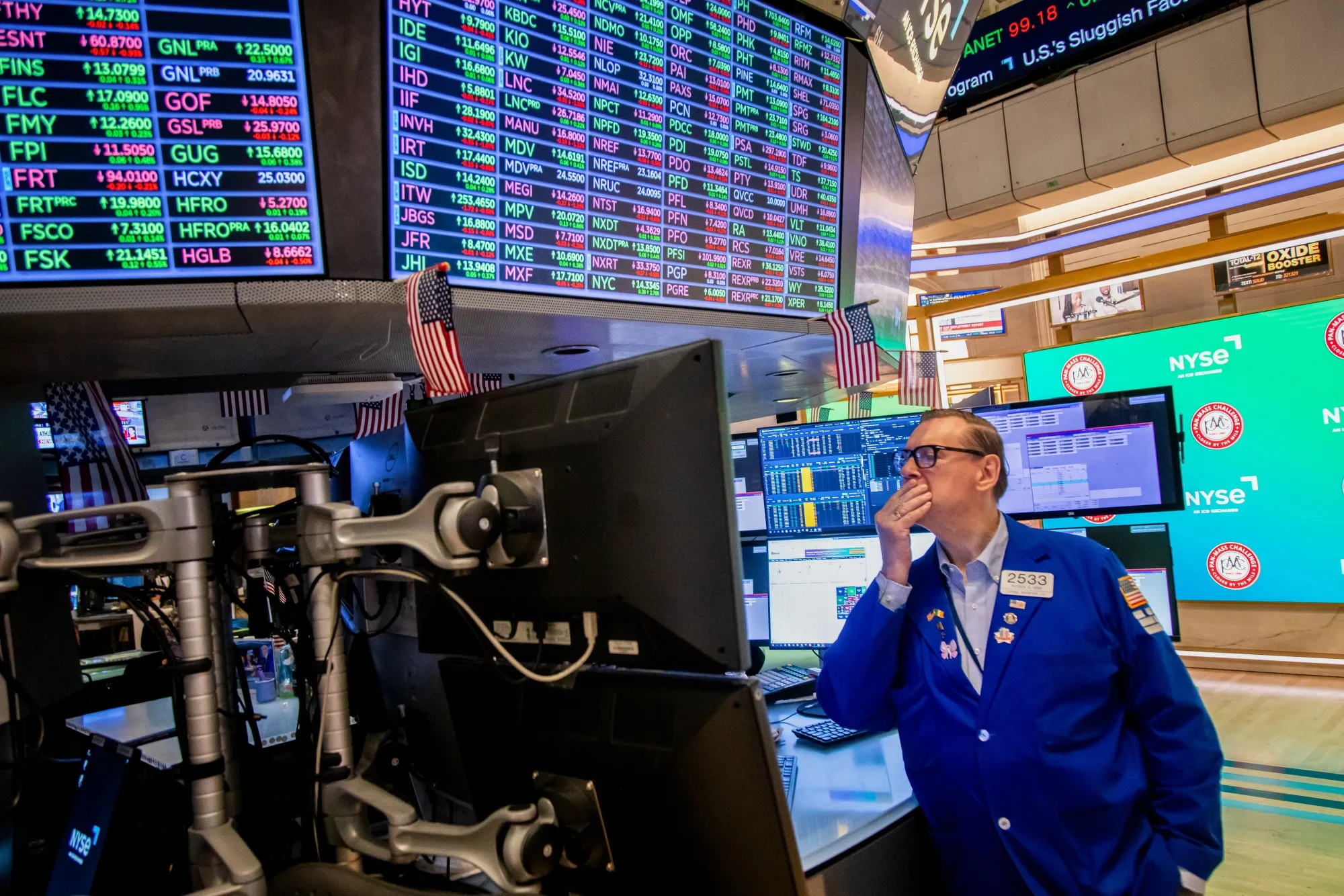 A trader works on the floor of the New York Stock Exchange.