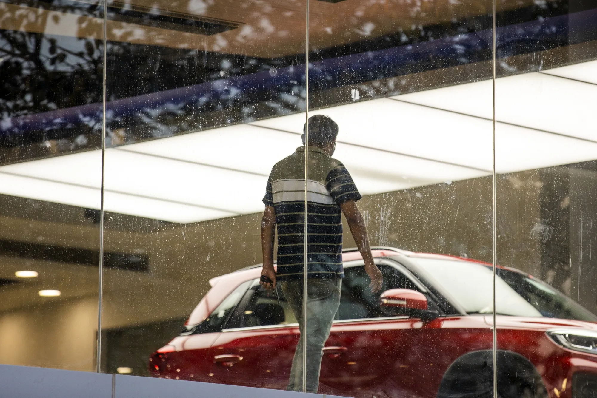 A customer at a showroom&nbsp;in Noida, Uttar Pradesh, India.