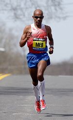 Meb Keflezighi runs alone on the race course during the 118th Boston Marathon on April 21