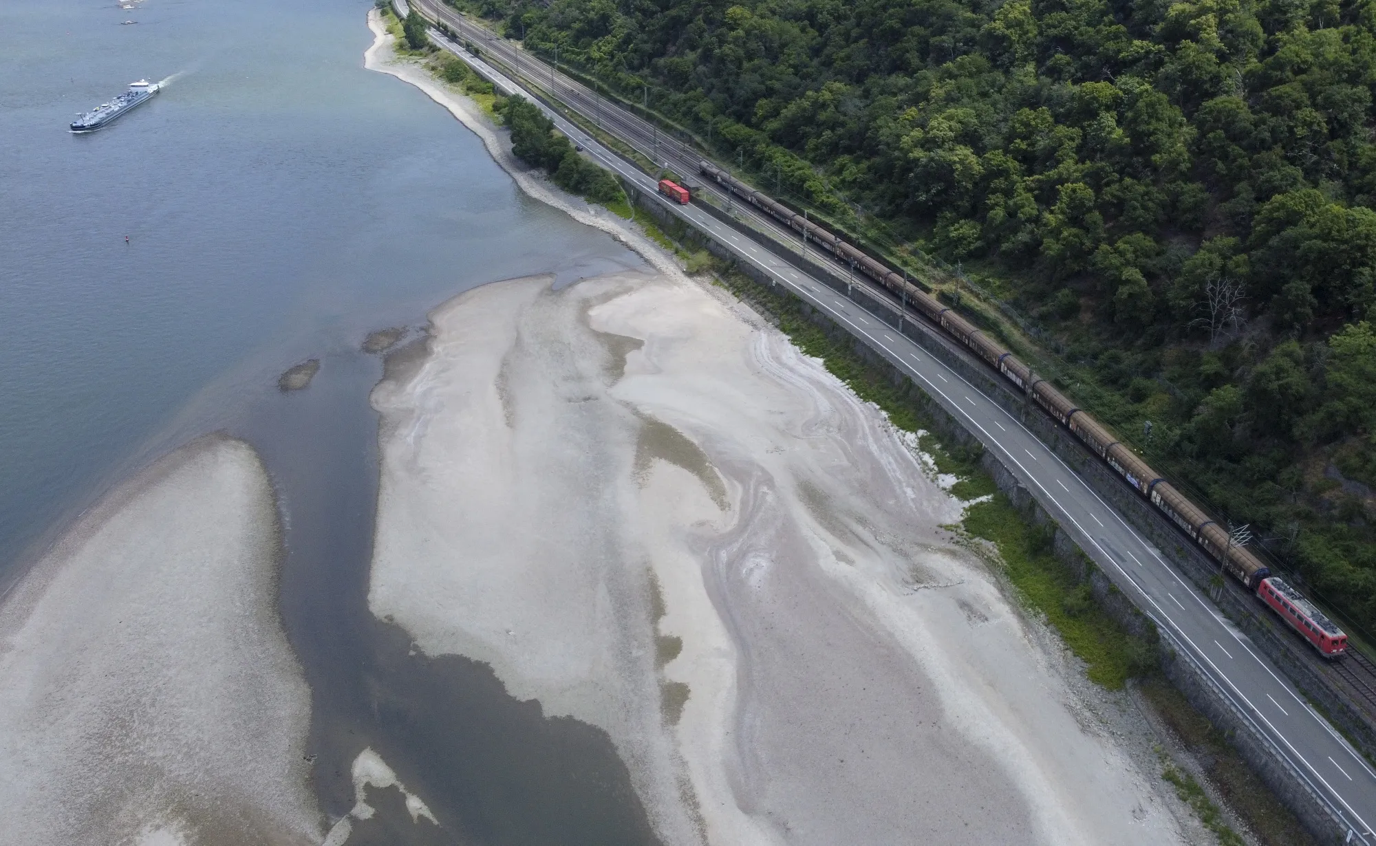 An oil tanker&nbsp;sails past dry banks on the Rhine River near Oberwesel, Germany, on July 14.