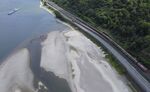 An oil tanker sails past dry banks on the Rhine River near Oberwesel, Germany, on July 14.