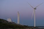 A wind turbine near the Avedore power station, operated by Orsted A/S, near Copenhagen, Denmark, on Wednesday, Aug. 20, 2025. Denmark's plan to inject billions of dollars into Orsted A/S has sparked political backlash at a time when taxpayers are already spending more on defense and the fiscal bonanza from drug giant Novo Nordisk A/S is fading. Photographer: Nichlas Pollier/Bloomberg
