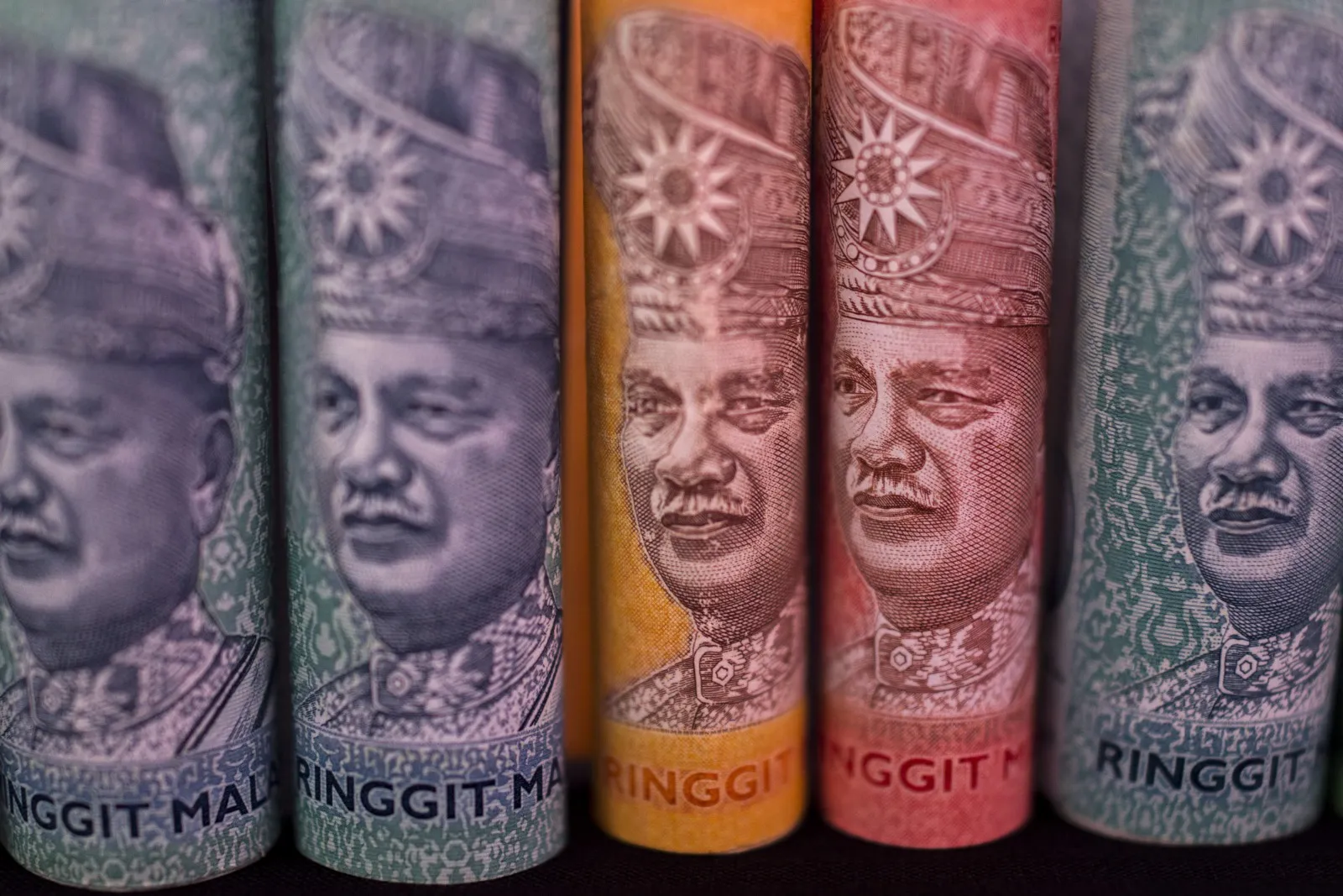 Stock Boards And Malaysian Ringgits As Currency Falls For Fourth Month