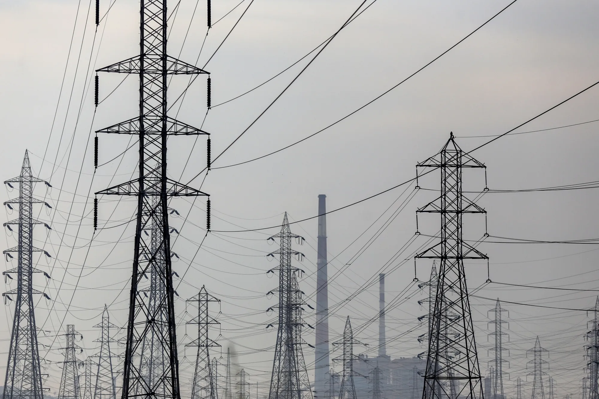 Electricity pylons near a Tata Power thermal power station in Mumbai.