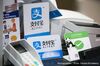 Signs for Ant Financial Services Group's Alipay.