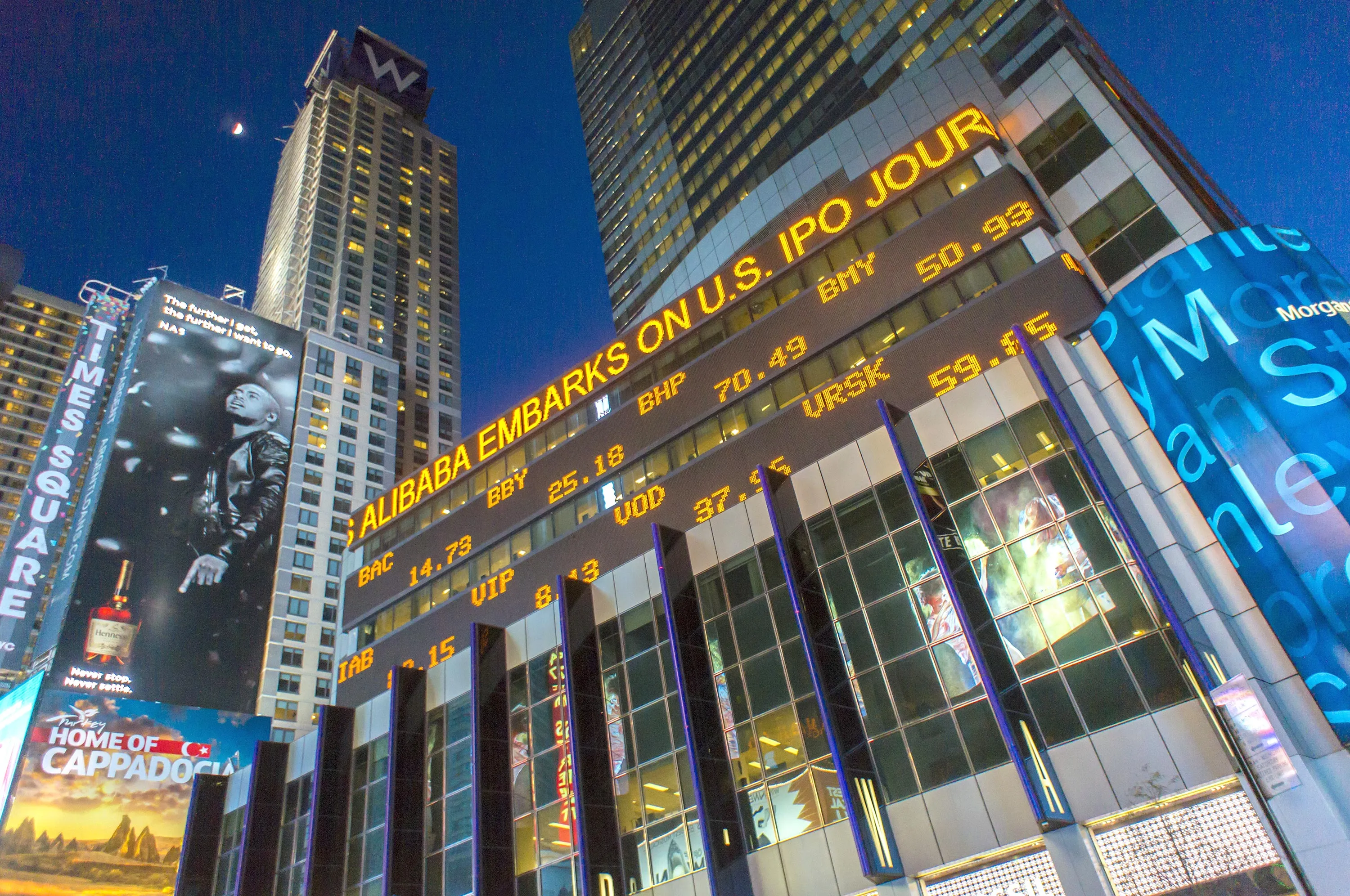 A news ticker on the Morgan Stanley building in Times Square in New York reports that the Chinese e-commerce behemoth Alibaba has announced that it has filed plans for an initial public offering on May 6, 2014. Photographer: Richard Levine/Demotix/Corbis