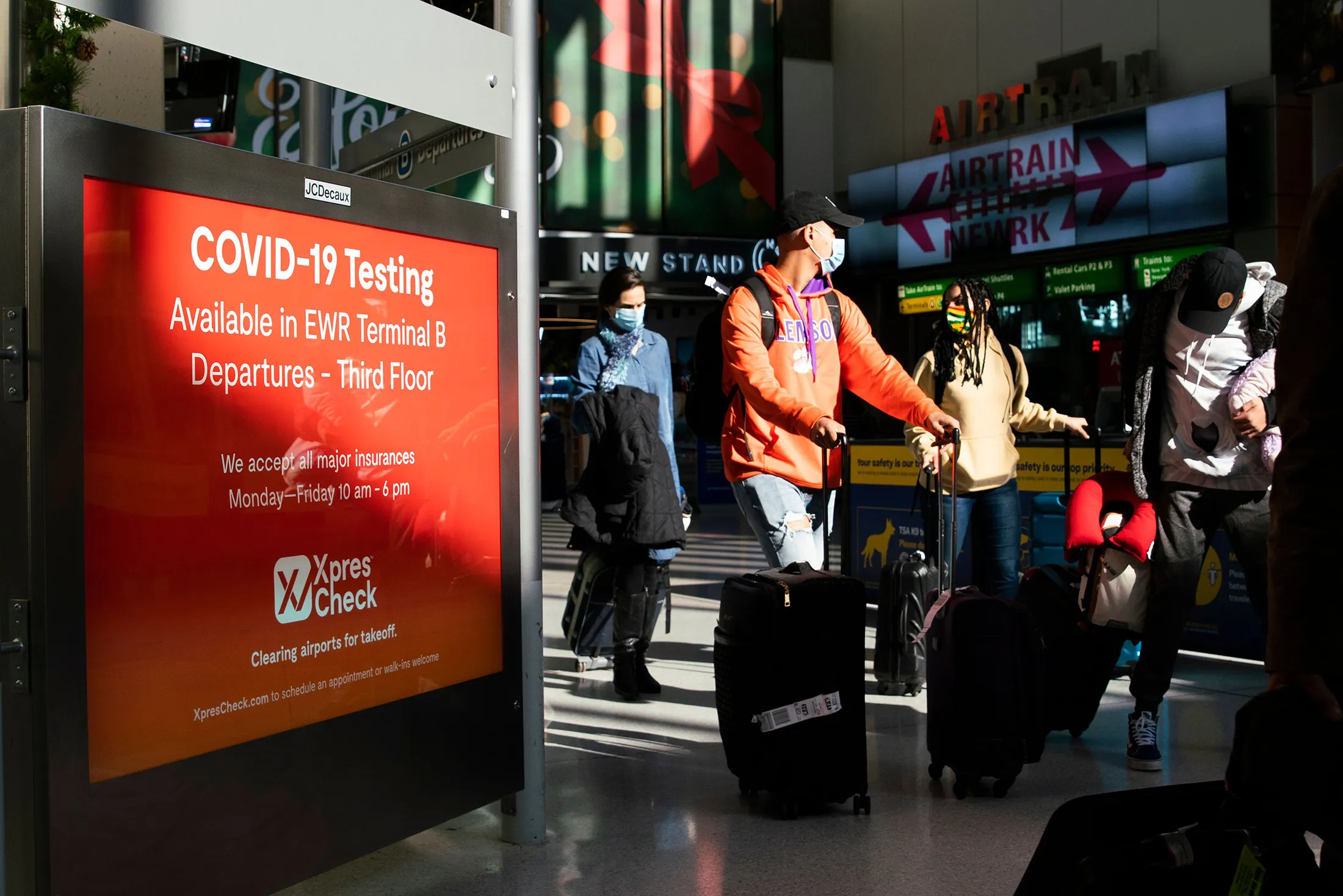 Travelers walk through Newark International Airport in Newark, New Jersey, on Nov.&nbsp;21.