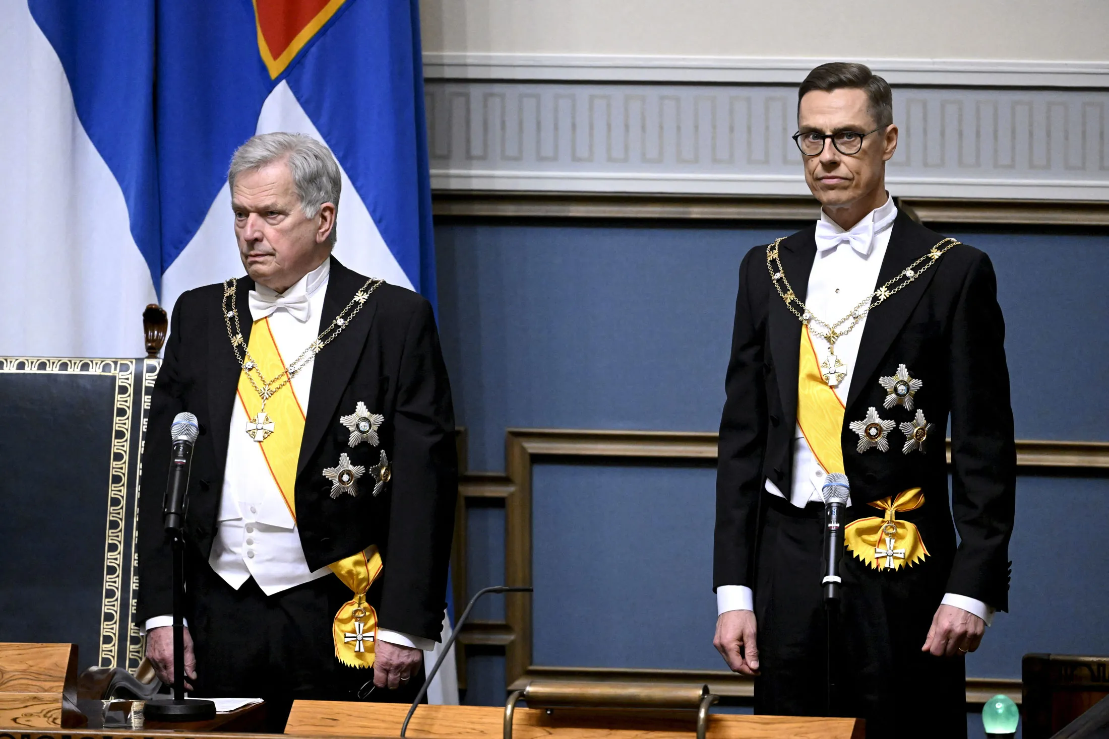 Alexander Stubb, right, takes over as president from Sauli Niinisto in Helsinki on March 1.