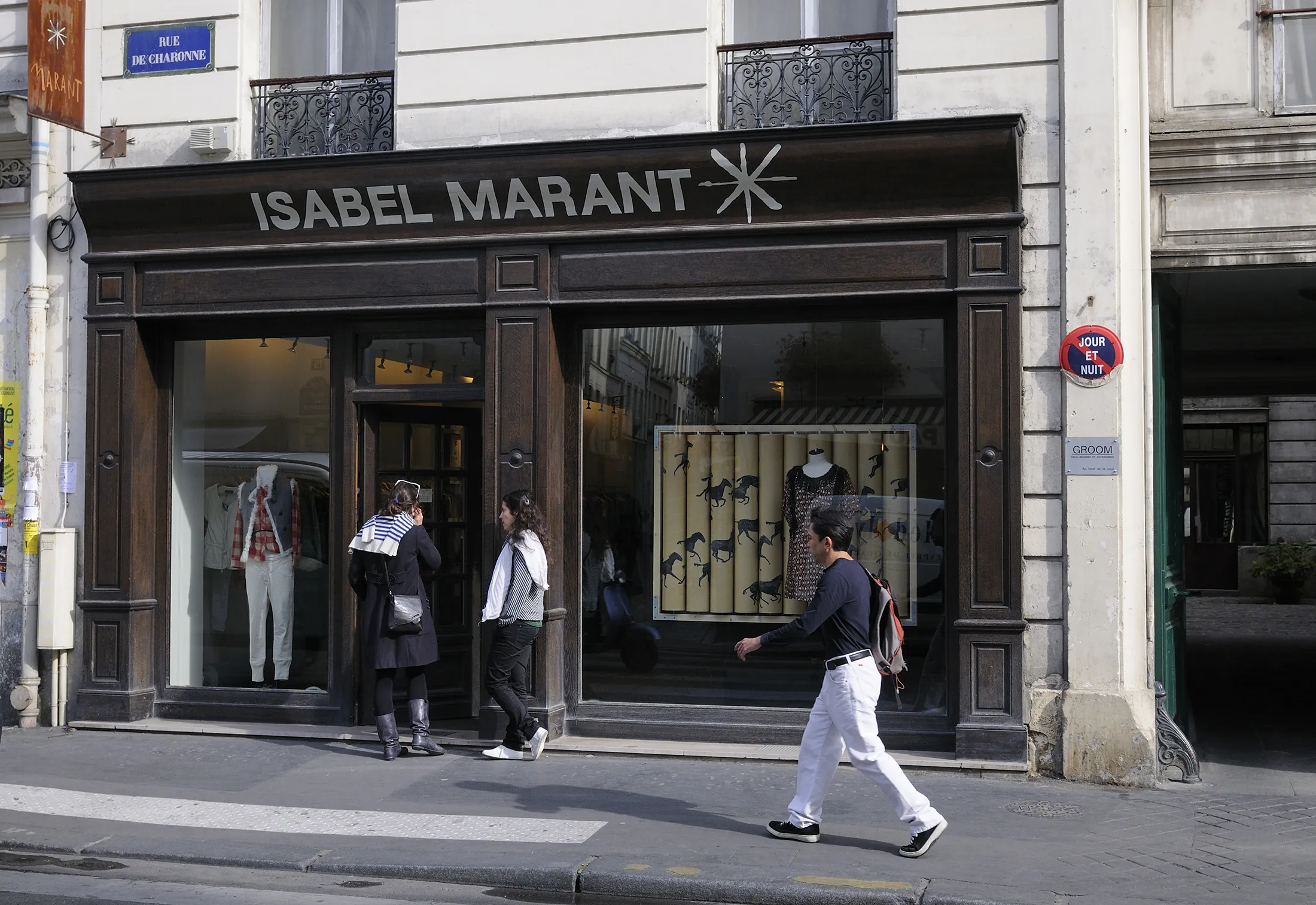 A pedestrian walk past an Isabel Marant store in Paris.
