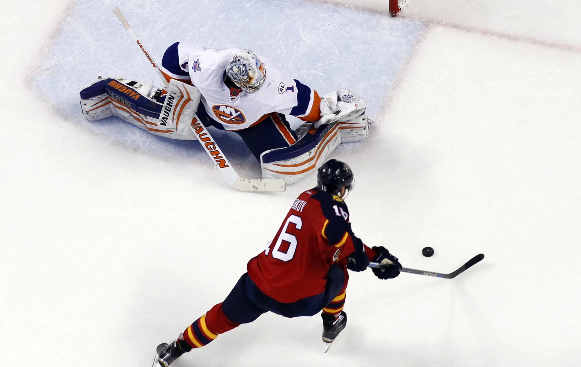 Goaltender Thomas Greiss #1 of the New York Islanders makes the save on a penalty shot by Aleksander Barkov #16 of the Florida Panthers during the first overtime period in Game Five of the Eastern Conference First Round during the 2016 NHL Stanley Cup Playoffs at the BB&amp;T Center on April 22, 2016 in Sunrise, Florida.
