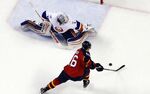 Goaltender Thomas Greiss #1 of the New York Islanders makes the save on a penalty shot by Aleksander Barkov #16 of the Florida Panthers during the first overtime period in Game Five of the Eastern Conference First Round during the 2016 NHL Stanley Cup Playoffs at the BB&T Center on April 22, 2016 in Sunrise, Florida.