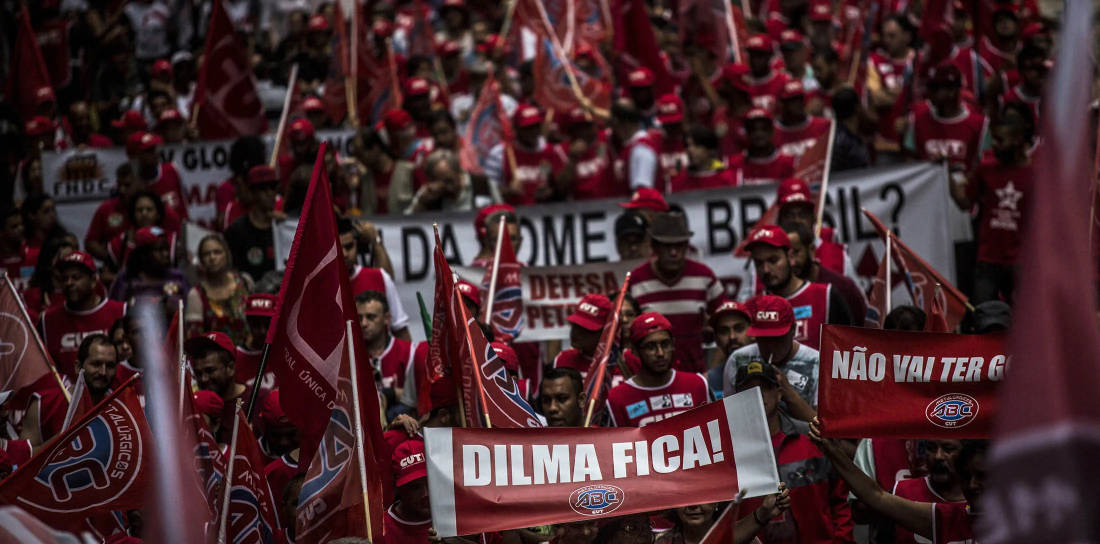 Demonstrators chant while waving flags during a protest against impeachment proceedings for Brazilian President Dilma Rousseff in Rio de Janeiro, Brazil, on Tuesday, Dec. 8, 2015. Brazil's Vice President Michel Temer has taken a personal swipe at Rousseff for disdaining him and his party, aggravating a political crisis that could culminate in her impeachment.
