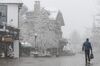 A pedestrian walks along an empty street in Vail, Colorado, U.S., on Thursday, March 19, 2020.
