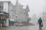 A pedestrian walks along an empty street in Vail, Colorado, U.S., on Thursday, March 19, 2020.