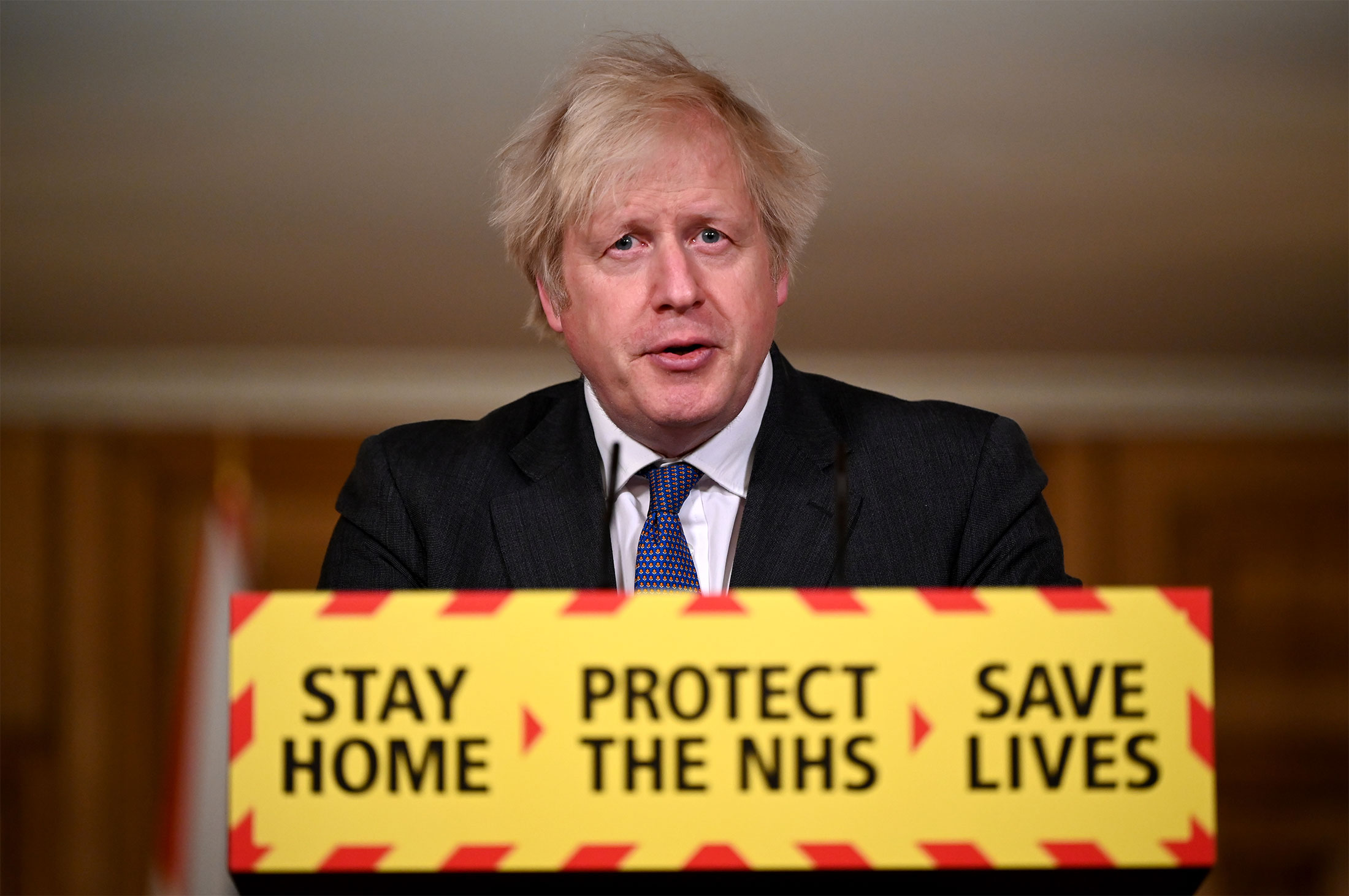 British Prime Minister Boris Johnson speaks during a coronavirus press conference at 10 Downing Street in London on January 22.