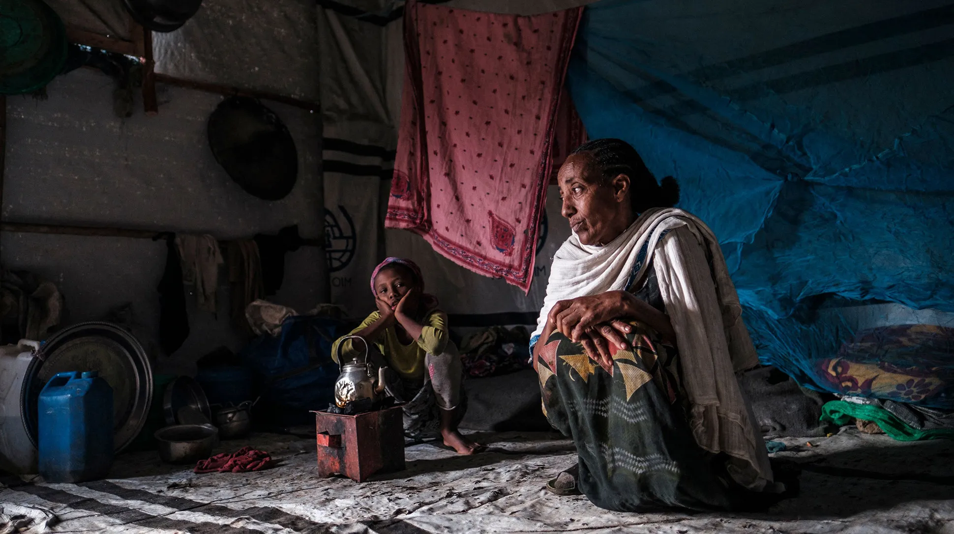 Internally displaced people&nbsp;in their shelter at a camp in the town of Azezo, Ethiopia, on July 12.