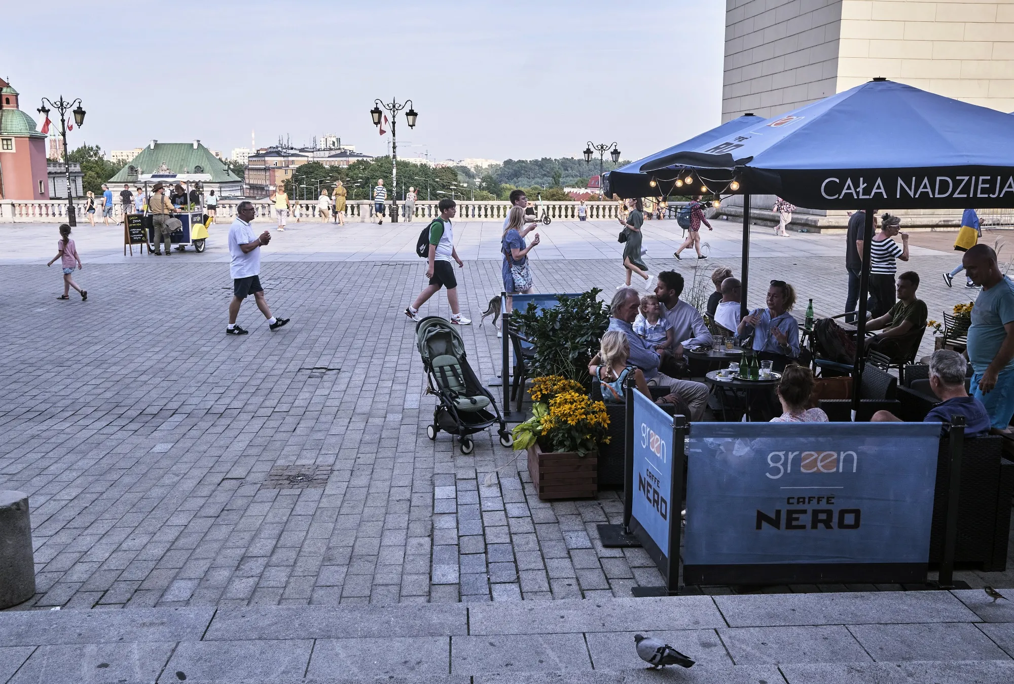 Customers at a cafe terrace in Warsaw. Poland.