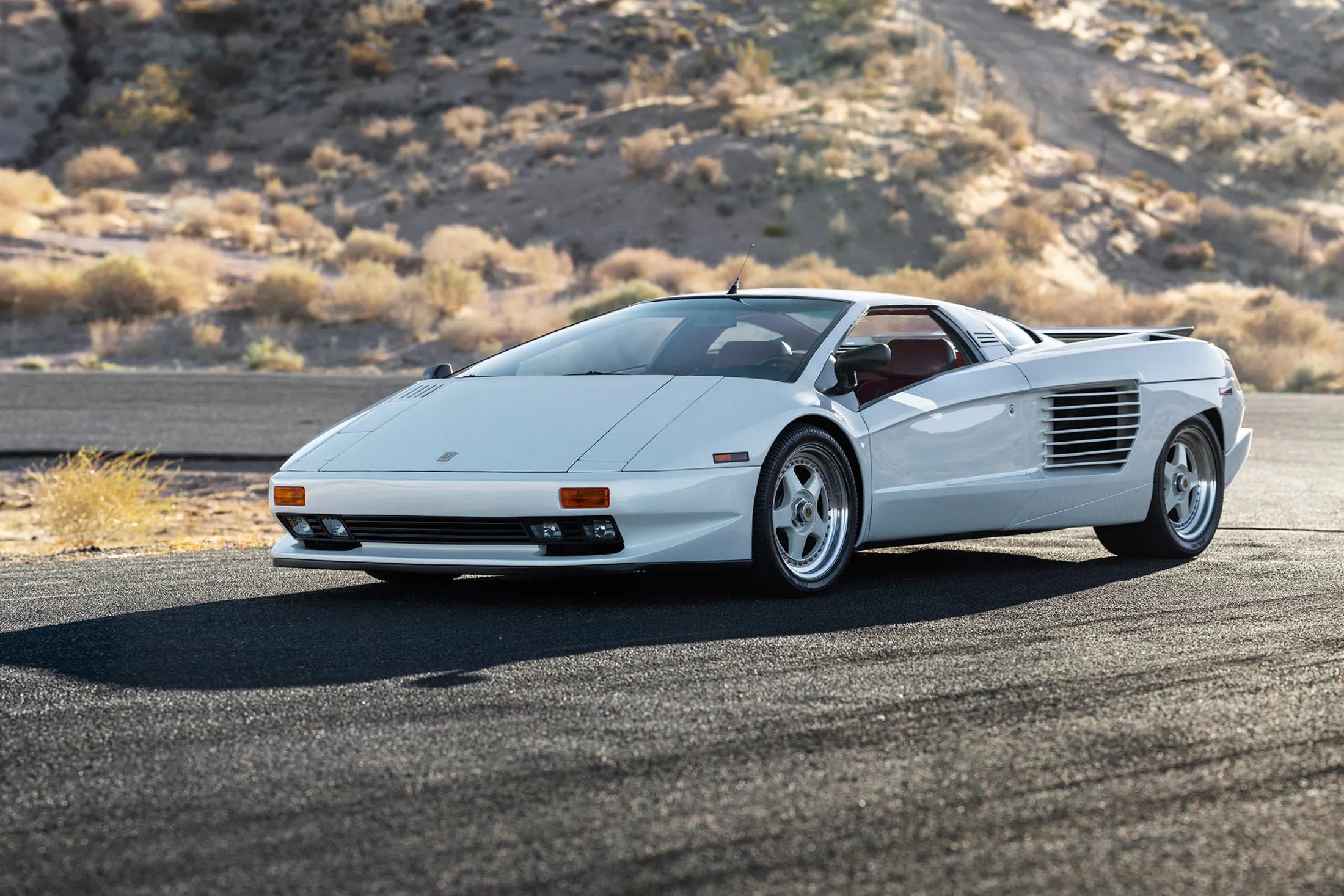 Sold alongside&nbsp;an NFT and finished in pearl white with red leather interior, this Cizeta-Moroder V16T prototype car debuted&nbsp;in Los Angeles in 1988 and is fully functional. It sold in Scottsdale, Ariz., for more than $1.3 million.&nbsp;