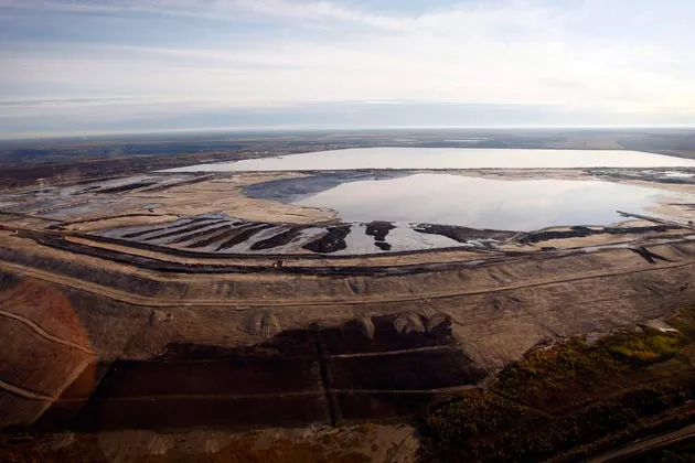 A tar sands tailings pond at a mine facility near Fort McMurray, Alta., in September 2011