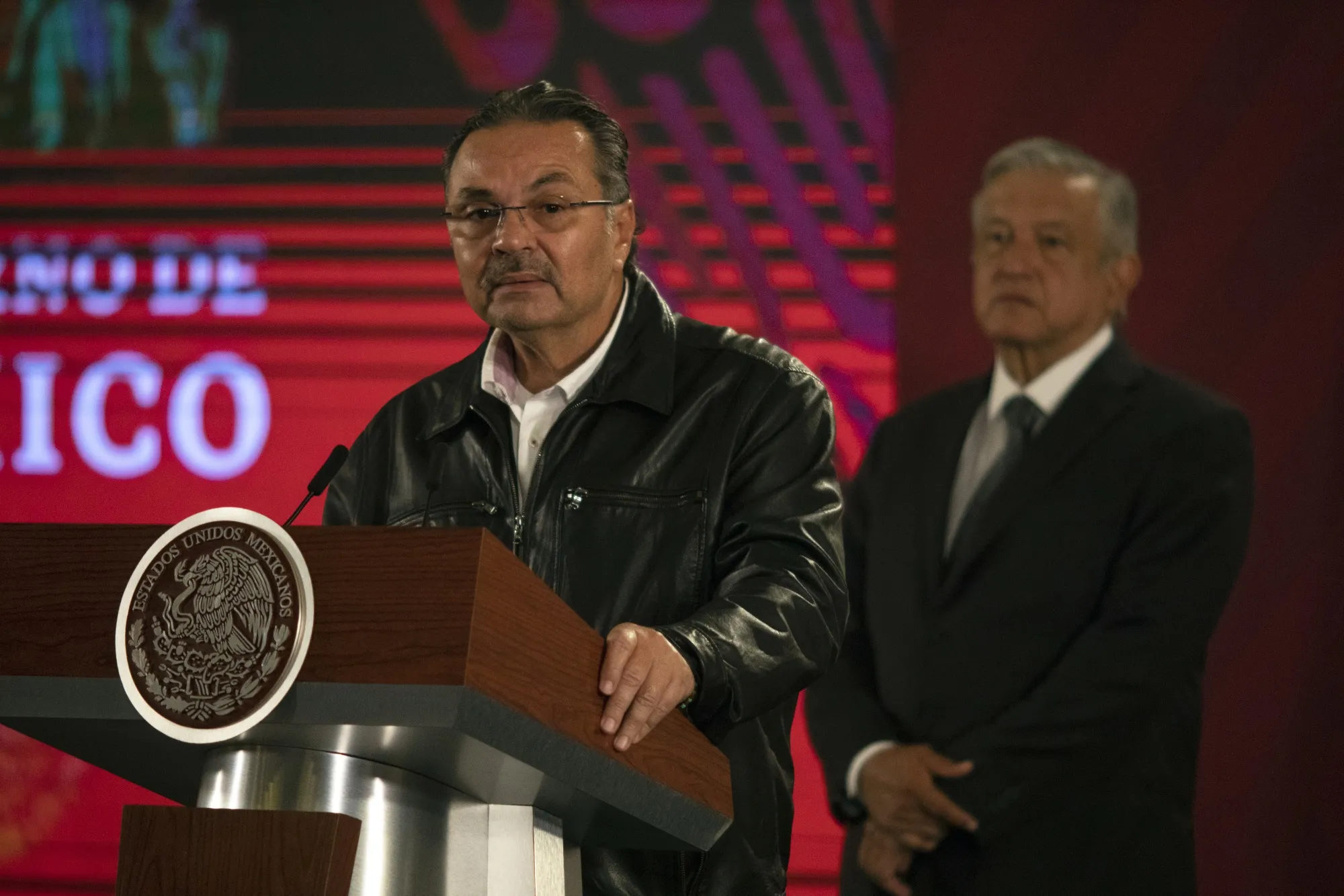 Octavio Romero Oropeza, chief executive officer of PEMEX, speaks while Andres Manuel Lopez Obrador, Mexico's president, right, listens during a news conference at the National Palace in Mexico City, on Jan. 7, 2020.