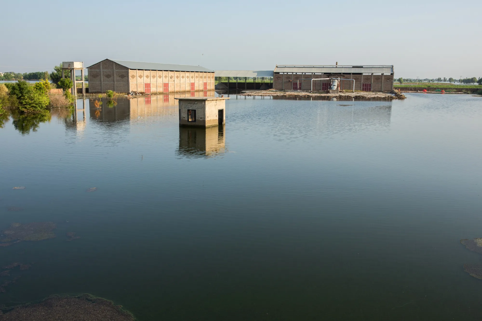 Flooded water surround the New Jhoolay Lal Cotton Ginners &amp; Oil Mill in Sanghar district, Sindh province, Pakistan, on&nbsp;Sept. 10.&nbsp;