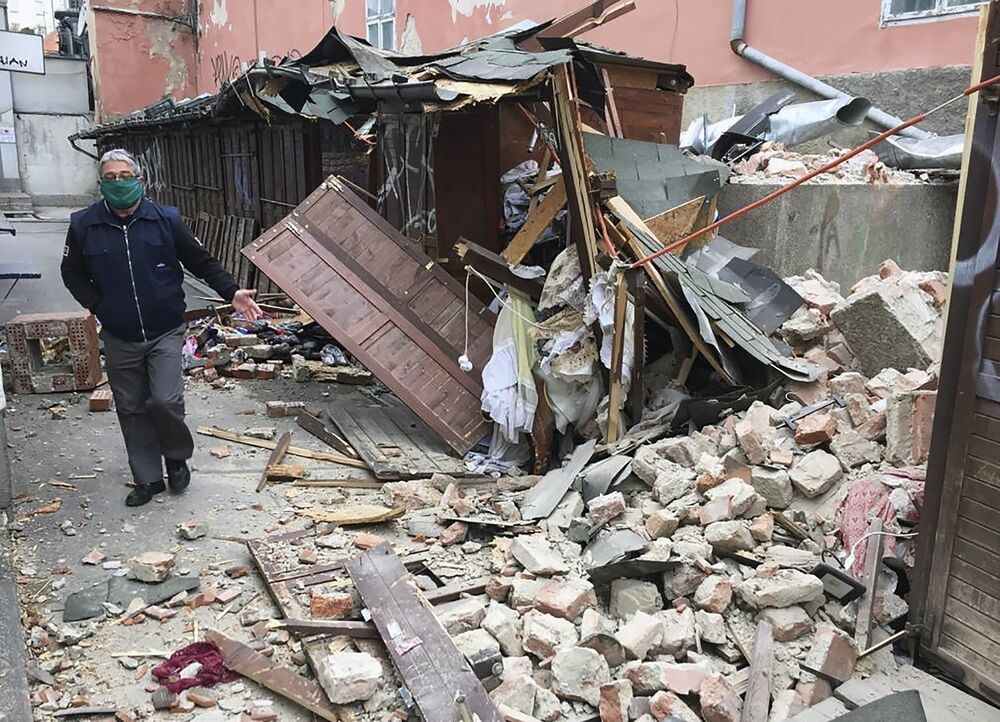 A man inspects the damage caused by an earthquake in Zagreb on March 22.