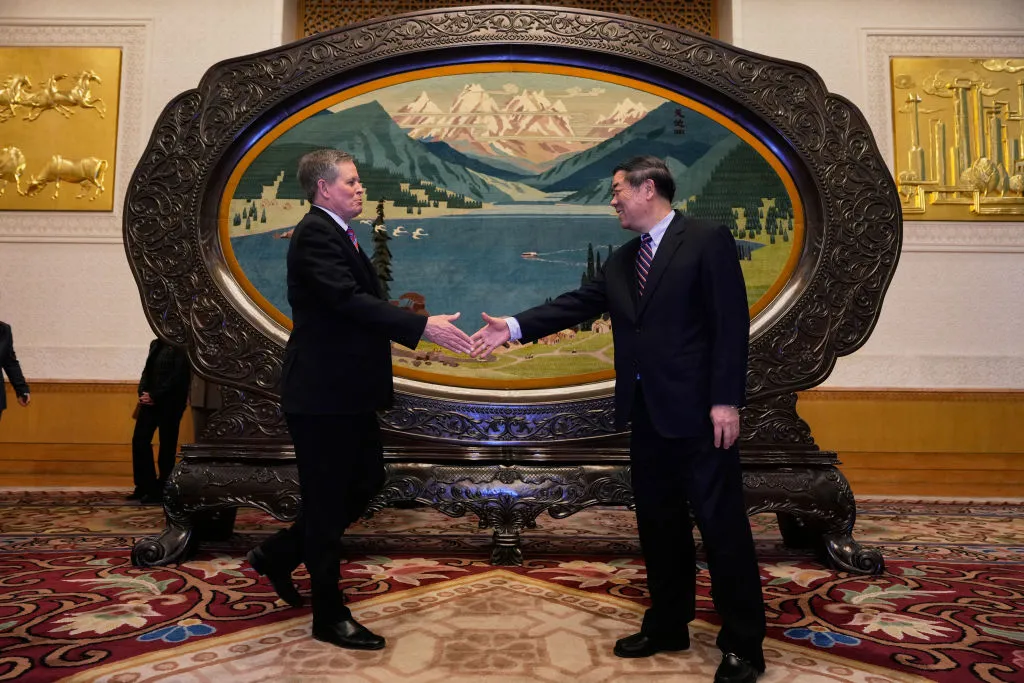 He Lifeng&nbsp;with Steve Daines at the Great Hall of the People in Beijing, on March 22