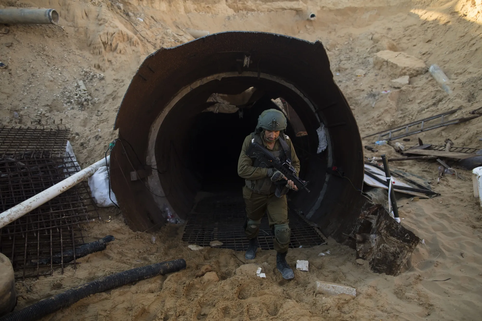 An Israeli soldier exits a tunnel near the border&nbsp;with Israel on December 15, 2023, in northern Gaza Strip.&nbsp;&nbsp;