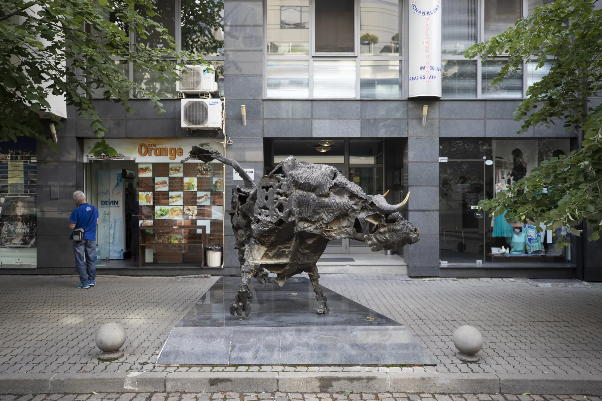 A bull statue stands outside the Bulgarian Stock Exchange in Sofia.