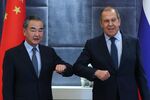 Wang Yi , left, and Sergei Lavrov in 2021.