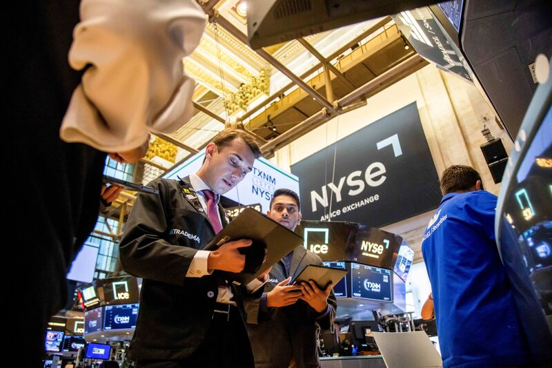 Traders work on the floor of the New York Stock Exchange (NYSE) in New York, US. 