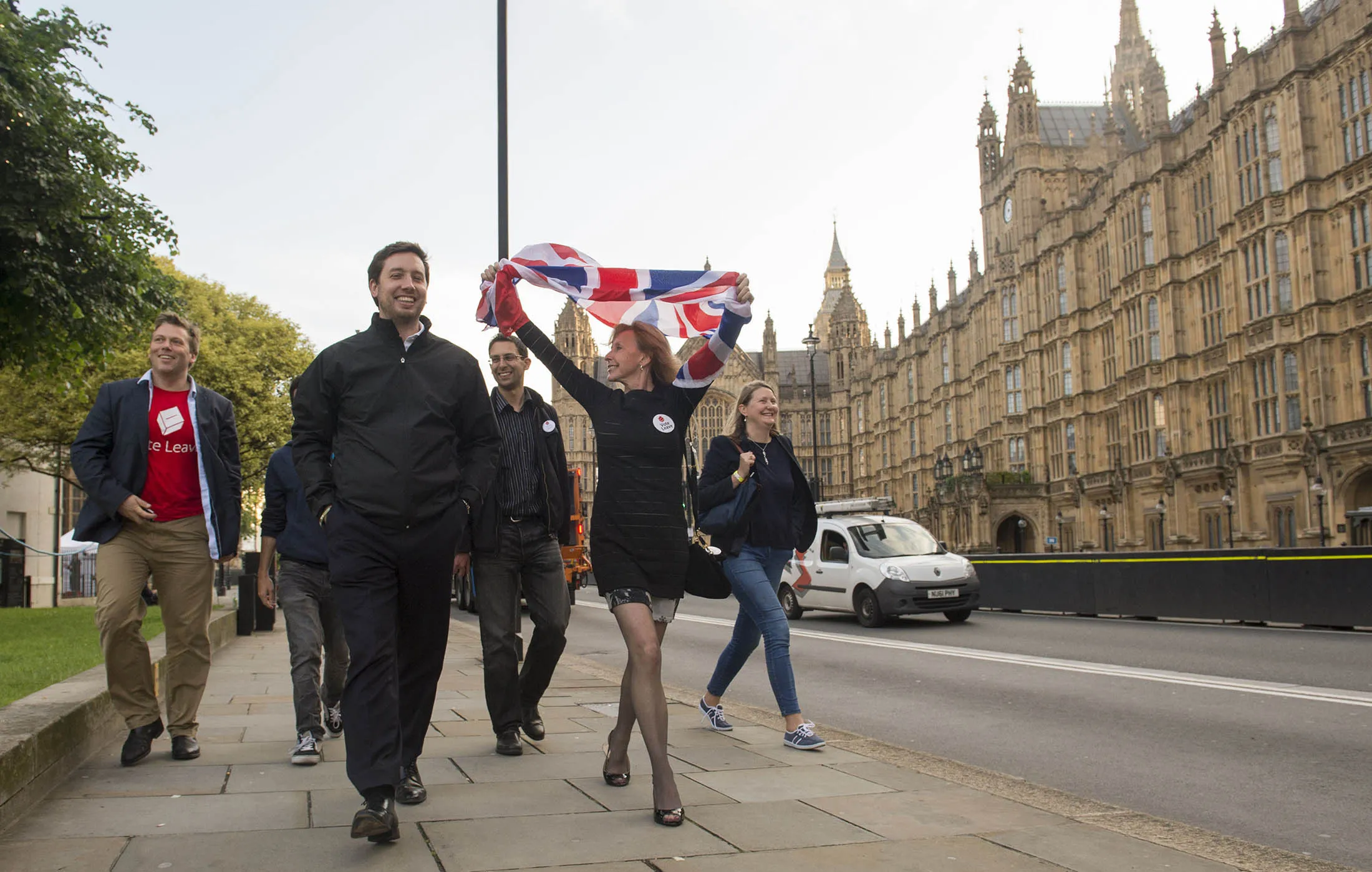 EU referendum. Leave supporters celebrate opposite the Houses of Parliament in London after voters in the referendum backed the campaign for the UK to leave the EU.
