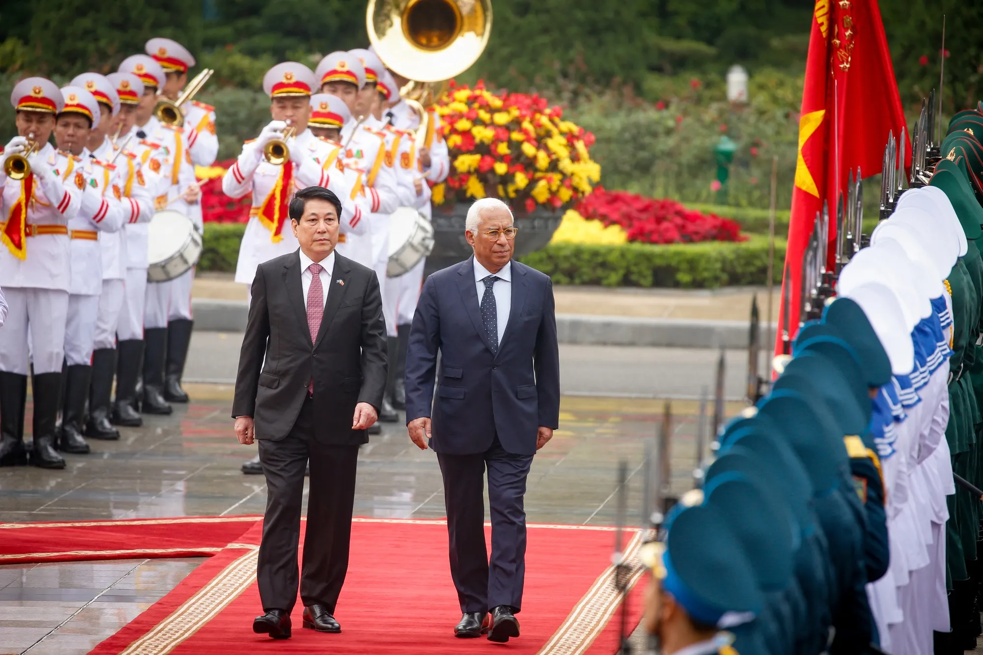 Vietnam's President Luong Cuong, left, and European Council President Antonio Costa review the guard of honour at the Presidential Palace in Hanoi on Jan. 29.