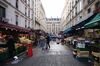 A market trader wheels a trolley between food stalls at an open air market in the 18th arrondisement of Paris, France, on Friday, Sept. 18, 2020. France’s daily coronavirus cases rose to the highest since the end of lockdown in May, as European infections continue a steady advance and raise the prospect of a return to the tighter restrictions that crippled activity in the second quarter.