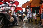Customers at a market in Bangkok, Thailand. The country currently has the highest inflation in 14 years. 