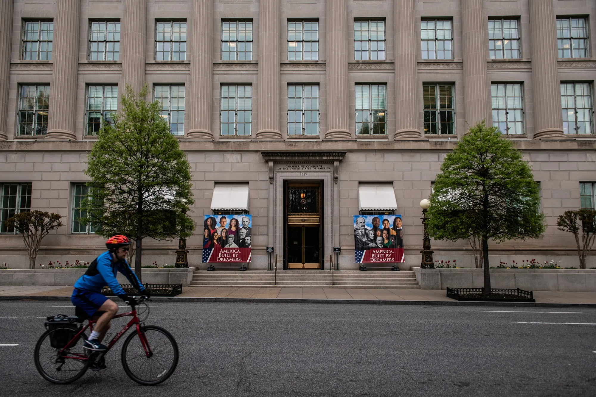 A cyclist rides past the&nbsp;U.S. Chamber of Commerce.