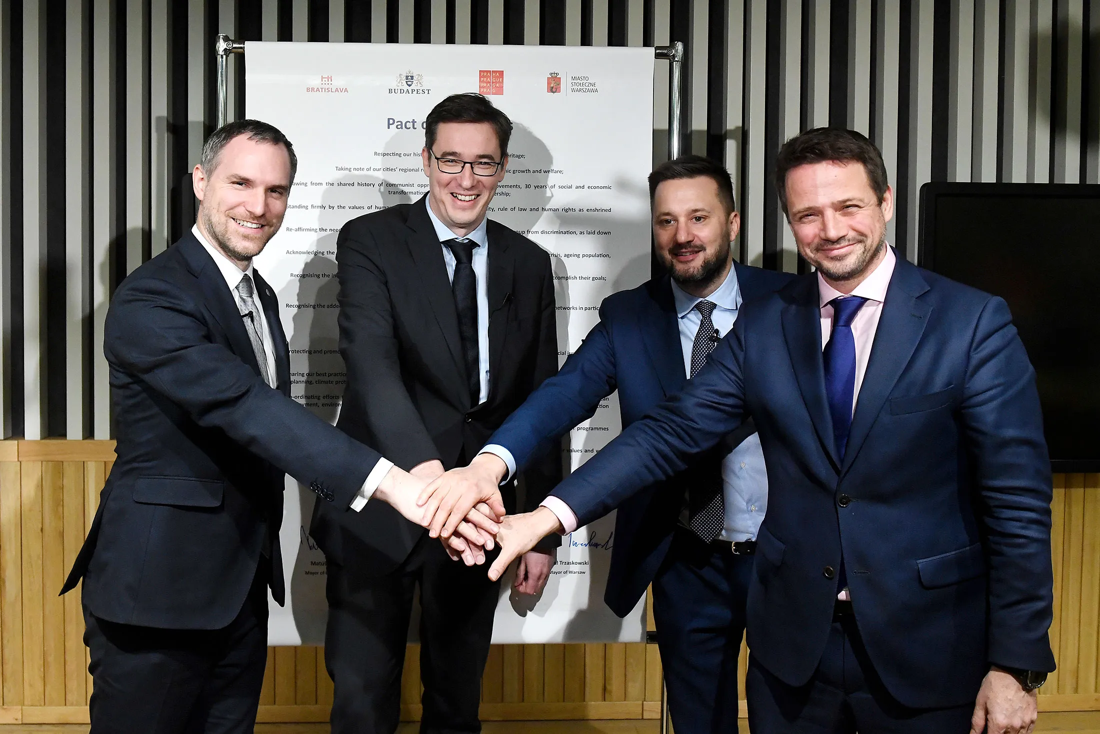 The mayors of the capitals of Czech Republic, Hungary, Poland and Slovakia, from left, Zdenek Hrib of Prague, Gergely Karacsony of Budapest, Matus Vallo of Bratislava, and Rafal Trzaskowski of Warsaw, pose after they signed the Pact of Free Cities in Budapest, Hungary on Dec. 16, 2019.&nbsp;
