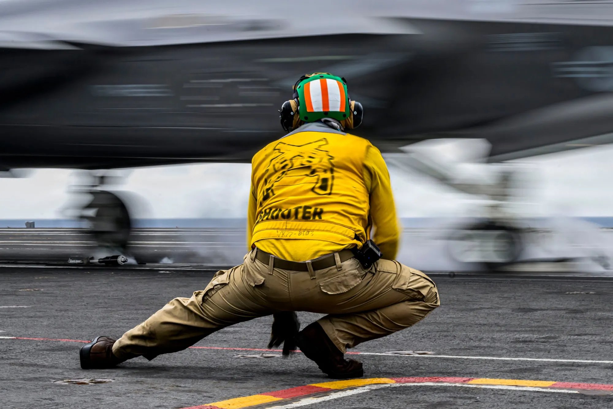 A fighter jet launches from the USS Theodore Roosevelt aircraft carrier in March.
