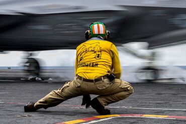 A fighter jet launches from the USS Theodore Roosevelt aircraft carrier in March.