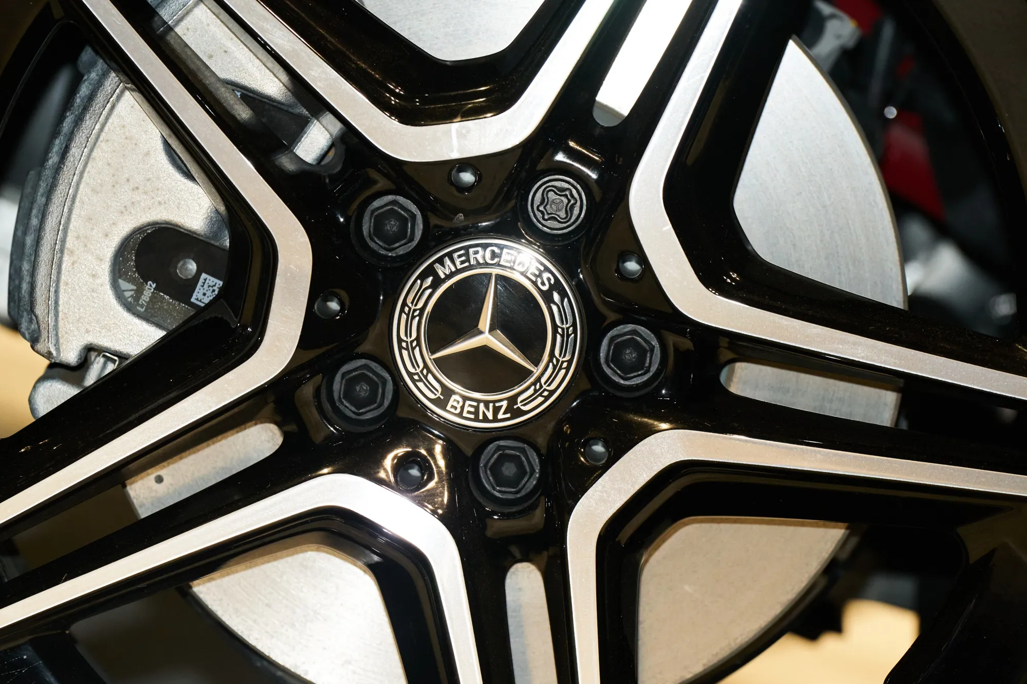 The wheel rim of a Mercedes-Benz vehicle.