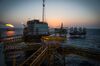 Gas flares burn from pipes aboard an offshore oil platform in the Persian Gulf's Salman Oil Field, operated by the National Iranian Offshore Oil Co., near Lavan island, Iran, on Thursday, Jan. 5. 2017. Nov. 5 is the day when sweeping U.S. sanctions on Iran’s energy and banking sectors go back into effect after Trump’s decision in May to walk away from the six-nation deal with Iran that suspended them.