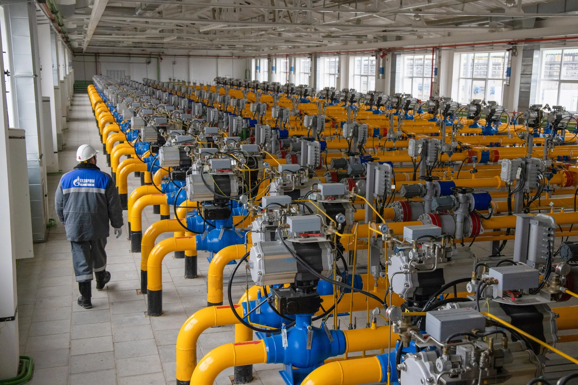 A worker inspects a gas collection point of the Kasimovskoye underground gas storage facility, operated by Gazprom PJSC, in Kasimov, Russia.