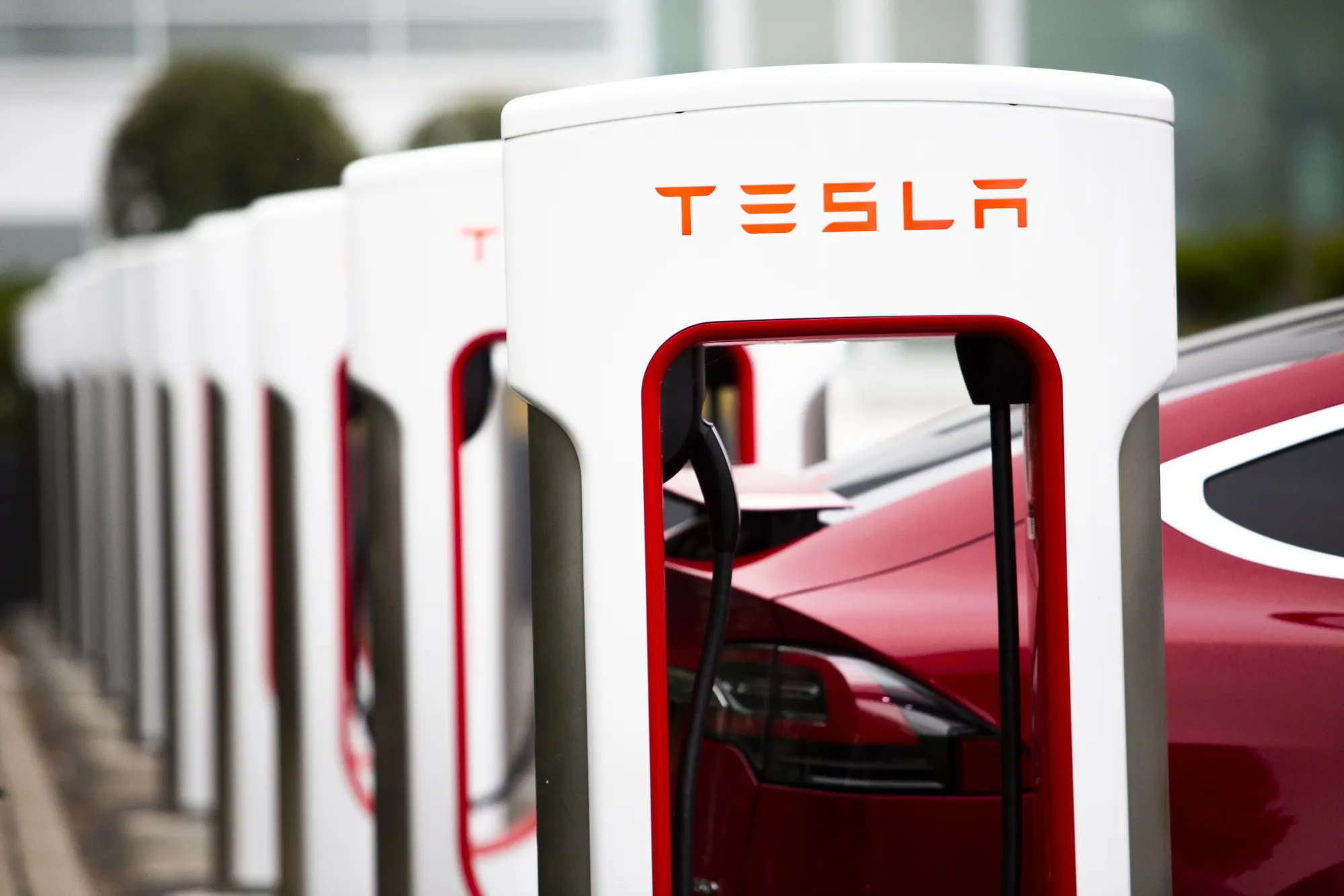 Tesla Inc. electric vehicles charge at the Tesla Supercharger station in Fremont, California, U.S., on July 20.