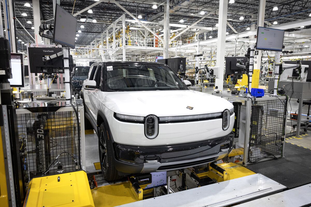 Rivian Cuts Hundreds of Jobs After Launch of New R2 Electric SUV - Bloomberg