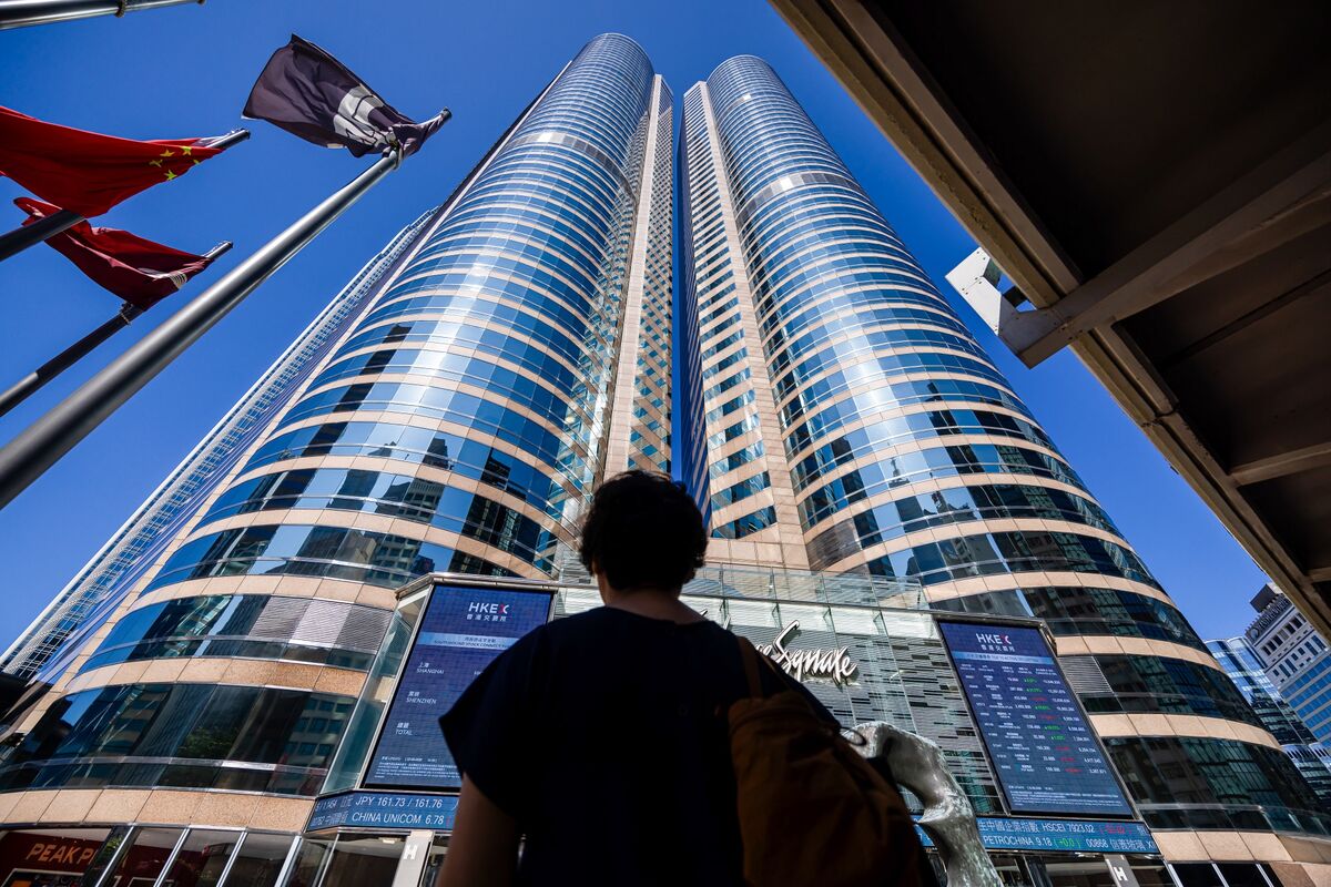 bloomberg.com - Sangmi Cha - Hong Kong Listing Spree Brings $1.8 Billion to Market in One Day