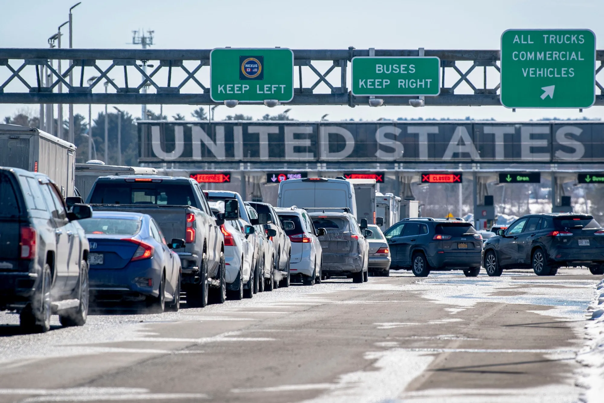 Vehicles in line to cross into the United States at the Canada-US border in St-Bernard-de-Lacolle, Quebec.