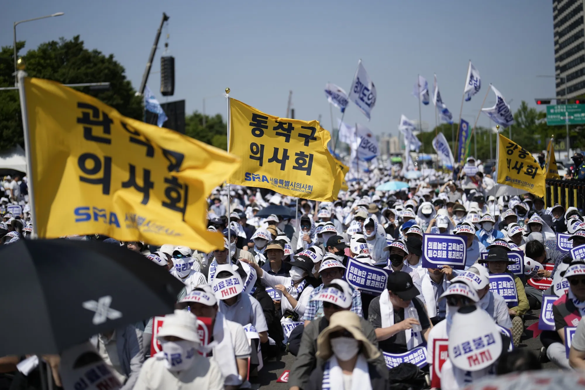 Members of The Korea Medical Association attend at a rally against the government's medical policy, in Seoul, in June 2024.