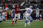 Tampa Bay Buccaneers linebacker Shaquil Barrett (58) pressures Dallas Cowboys quarterback Cooper Rush as he throws a pass in the second half of a NFL football game in Arlington, Texas, Sunday, Sept. 11, 2022. (AP Photo/Michael Ainsworth)