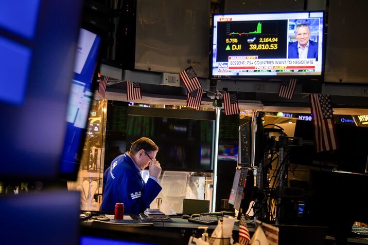 Traders On The Floor Of The NYSE As US Stocks Surge Most Since 2020 On Trump Reprieve
