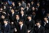 Vocational school students attend a rally to start off job-hunting in Tokyo, Japan, on Wednesday, Jan. 29, 2014. Japan's jobless rate held at 4 percent in October, and the number of positions on offer for every 100 people seeking work rose to 98, the highest level since 2007 -- a sign of tightening in the job market that could put upward pressure on wages.